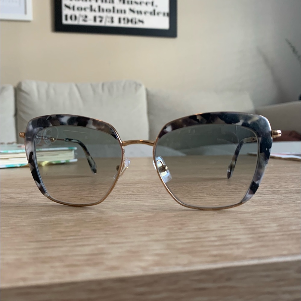 Miu Miu grey tortoiseshell sunglasses